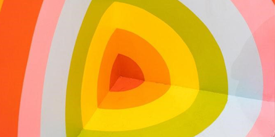 smooth edged triangle shapes shaded in deep orange contrasted with green, yellow, pink, rust and white