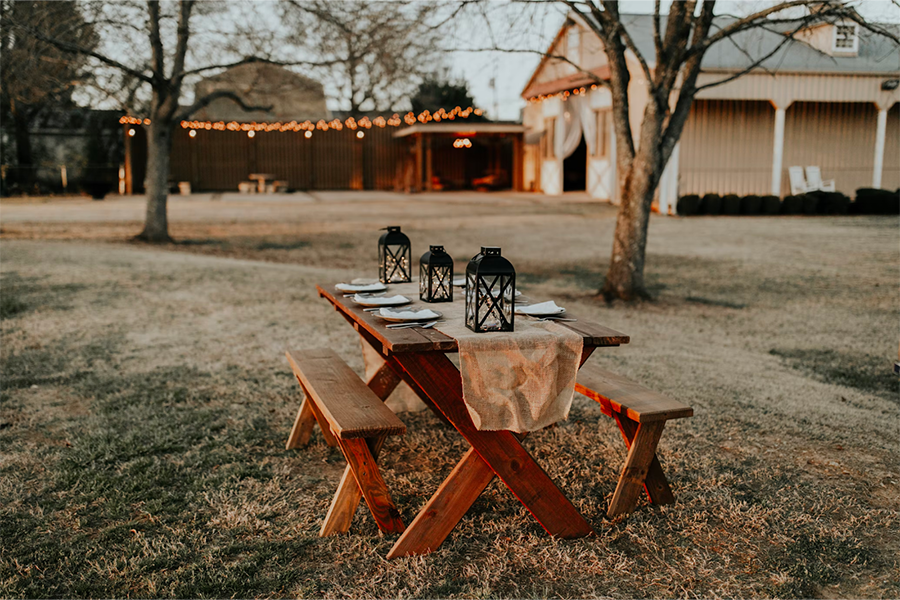 Sylish wooden picnic table in yard