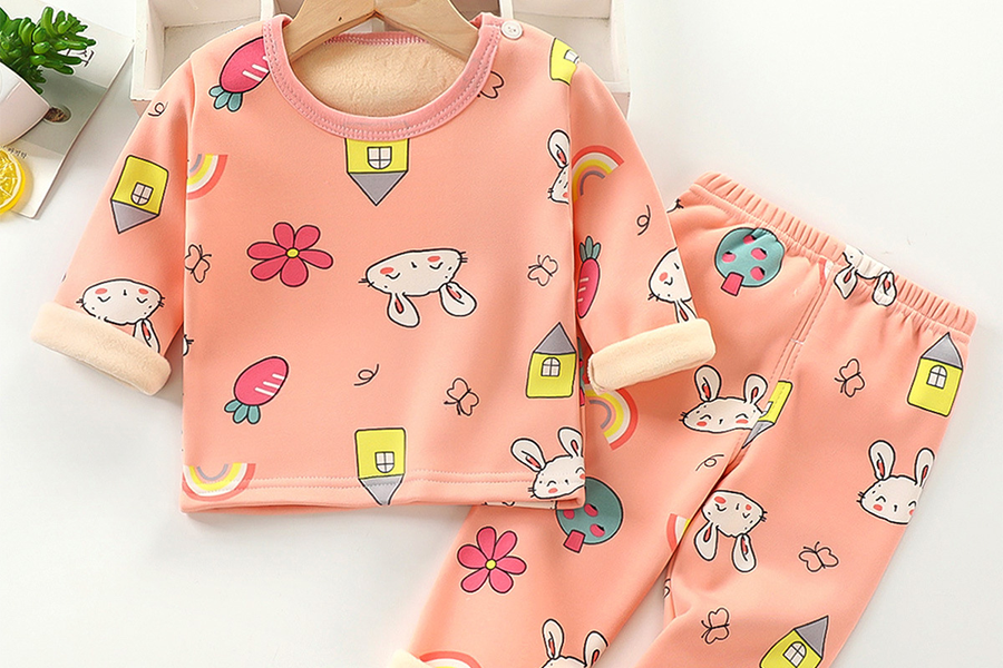 Pink kids pajama with cabincore cartoon prints
