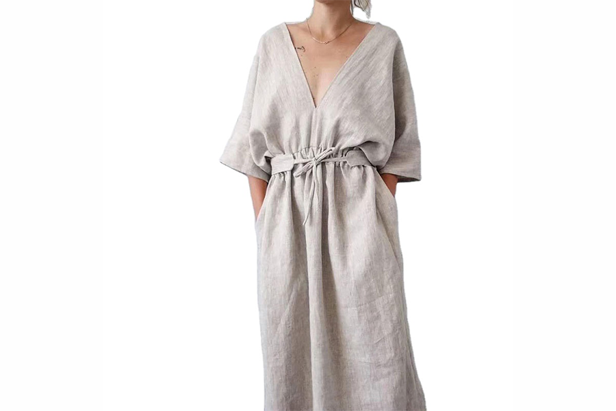 Woman wearing a luxury linen house dress