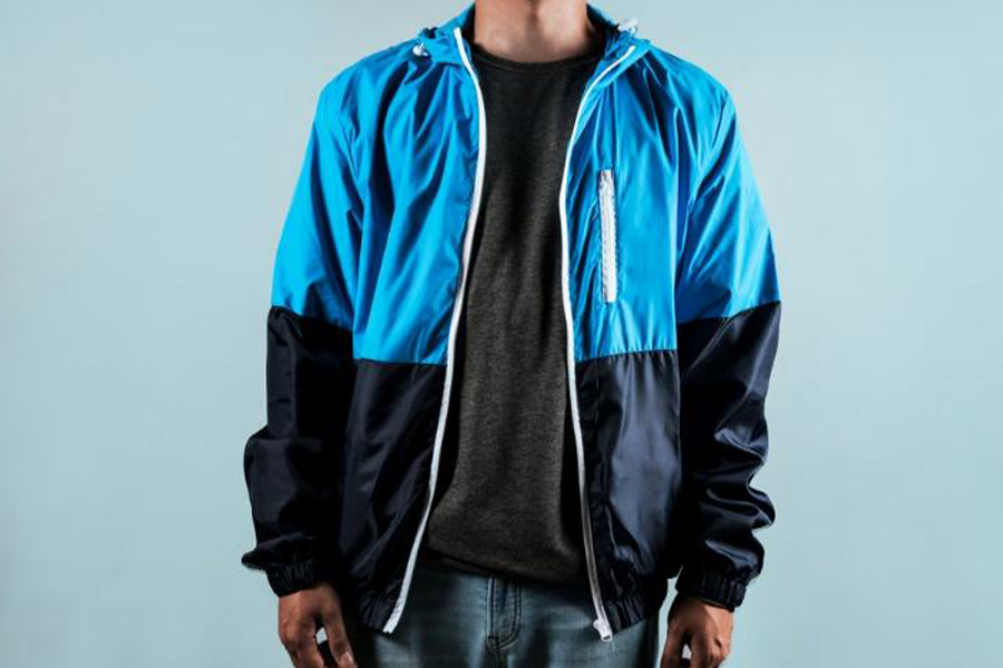 Blue lightweight men’s jacket with adjustable hood