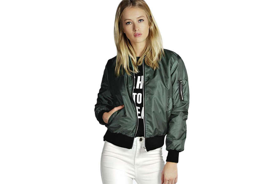 Woman in green bomber jacket