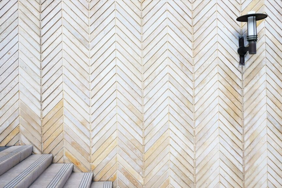 Exterior chevron-styled wallpaper trend by a staircase