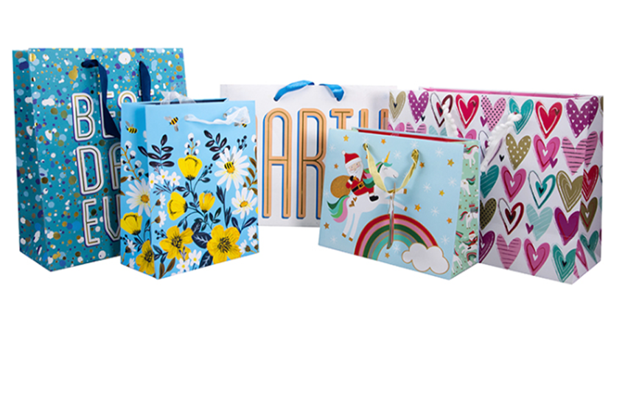 Ribbon handle gift bags in multiple prints