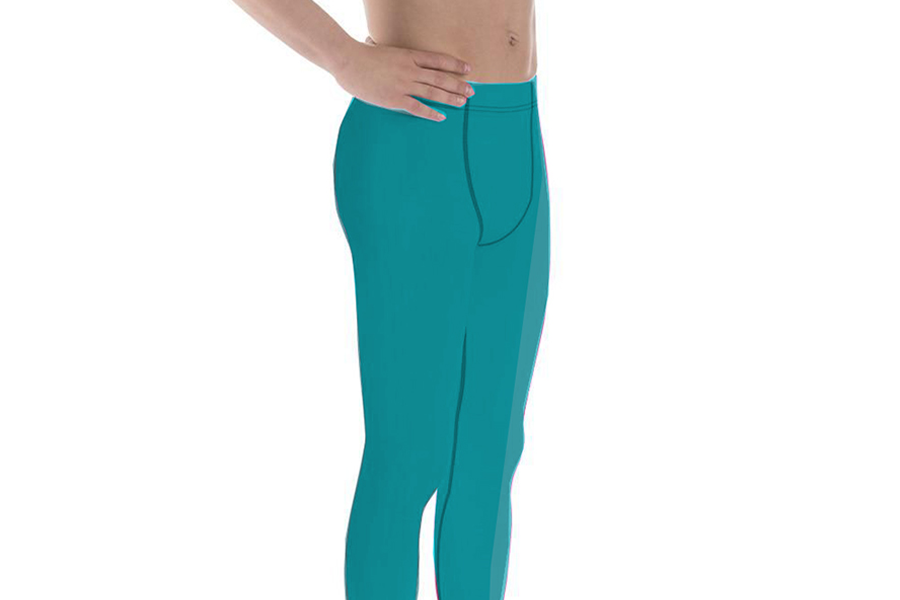 Man in cyan blue wellness tights with hands on waist