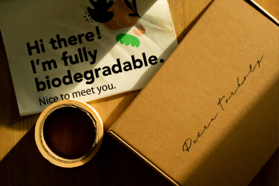Biodegradable poly mailer and cardboard box packaging