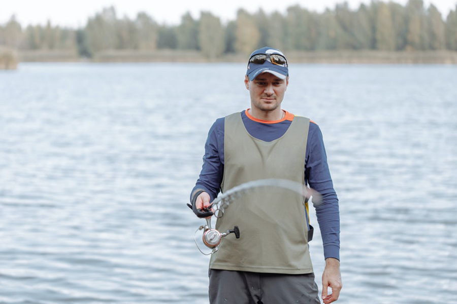 Man wearing a long-sleeved shirt while fishing