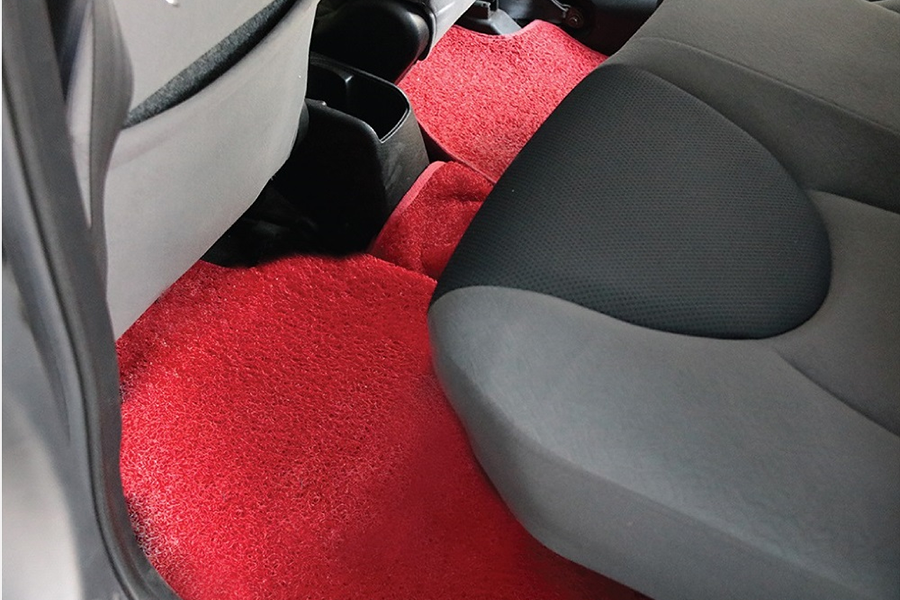 Red vinyl car floor mat