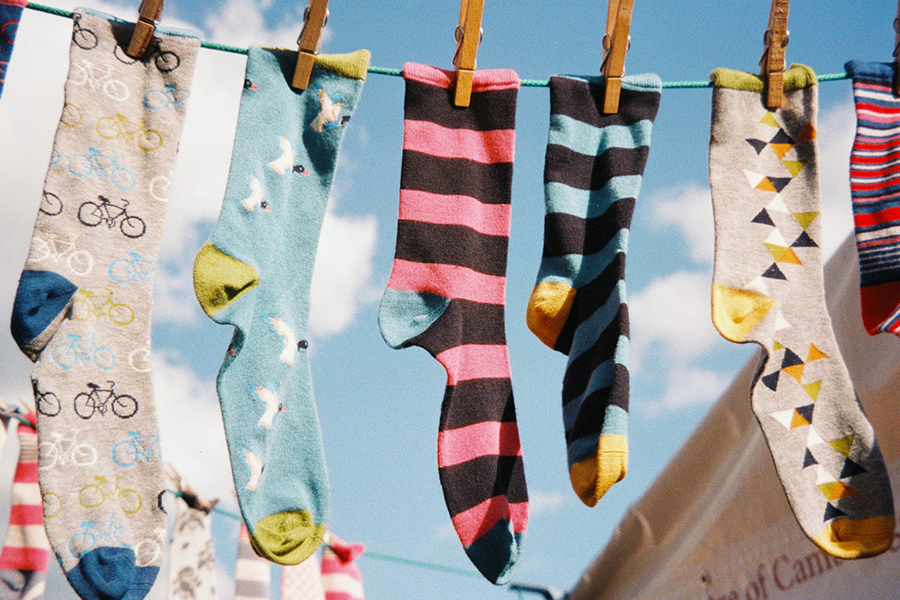 Patterned socks hanging on a line