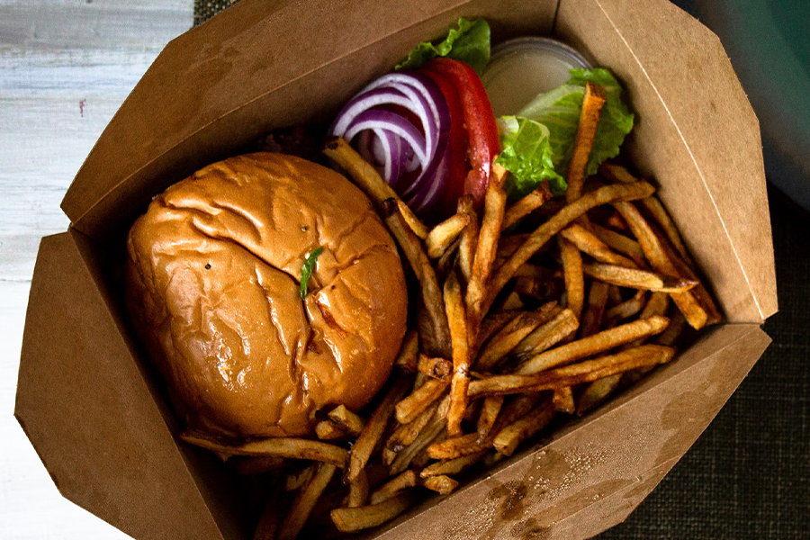 Burger and fries in a cardboard food container