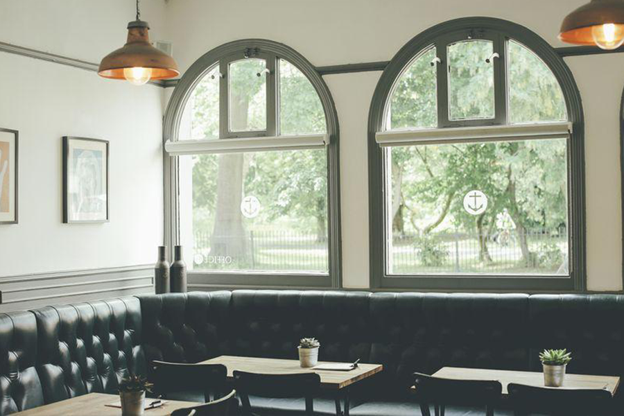 Cafe with gray arched window frames