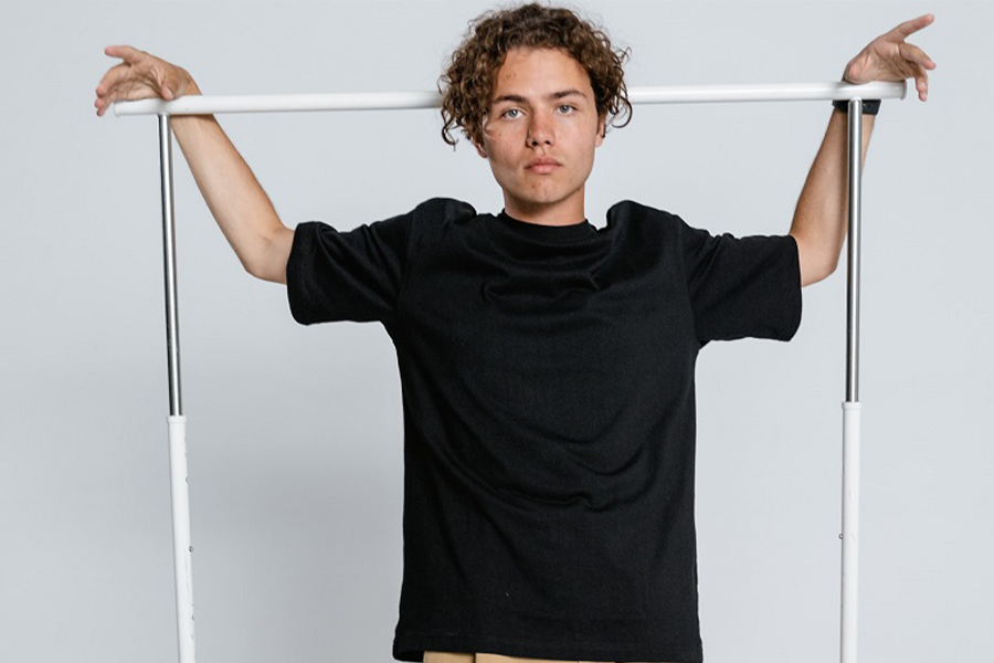 Young man posing with a black base layer T-shirt