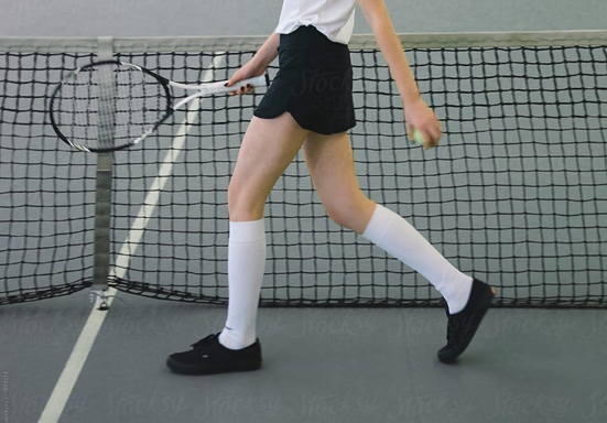 Tennis player wearing white knee socks