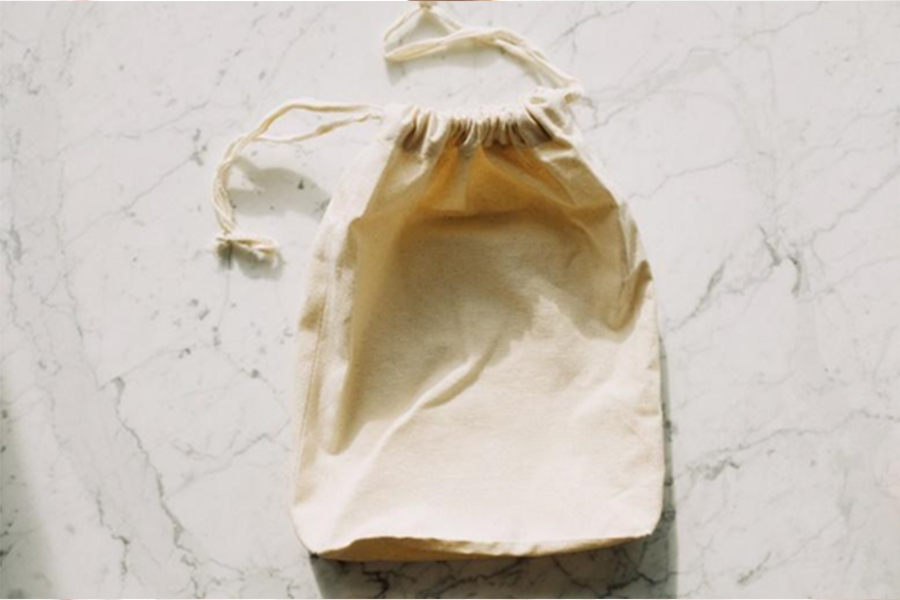 Beige cloth drawstring dust bag