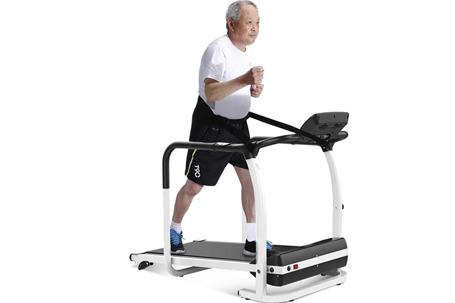 Senior citizen in white tee jogging on a treadmill