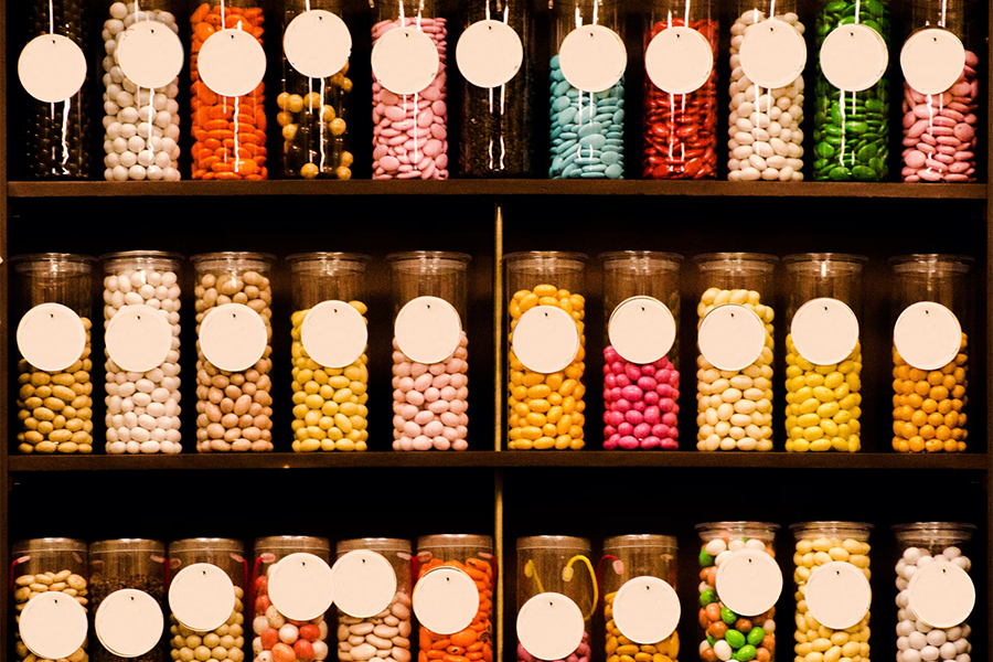 Assorted candies in glass jars