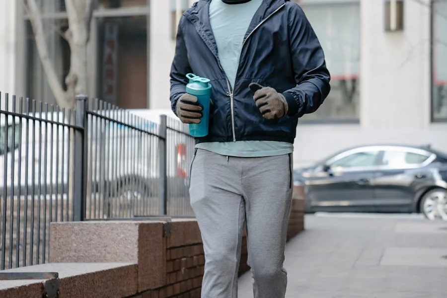 A man wearing gray joggers