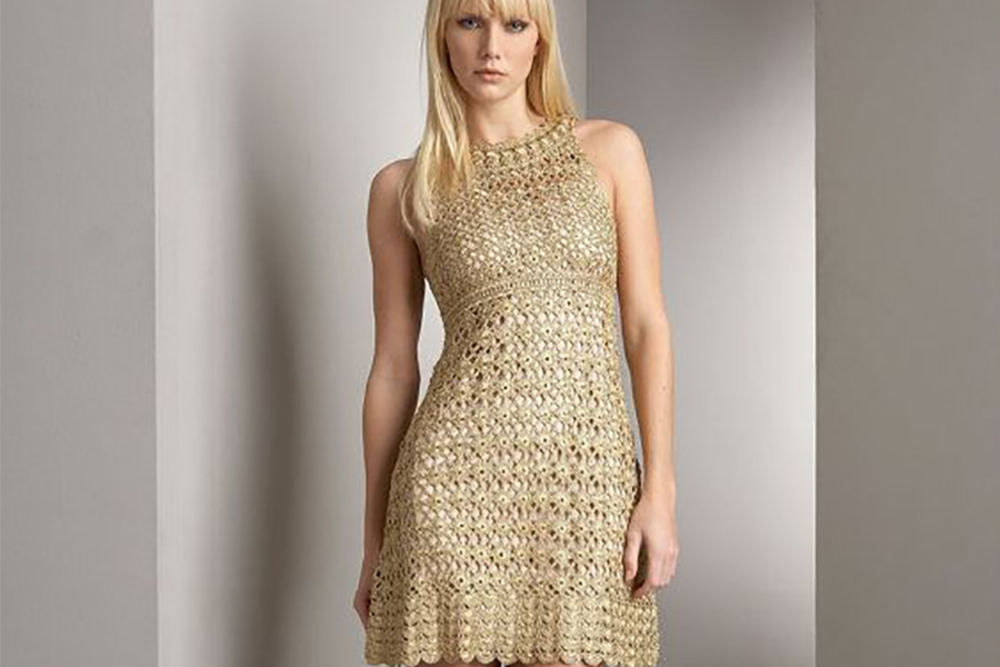 Model rocking golden-colored short empire waist dress