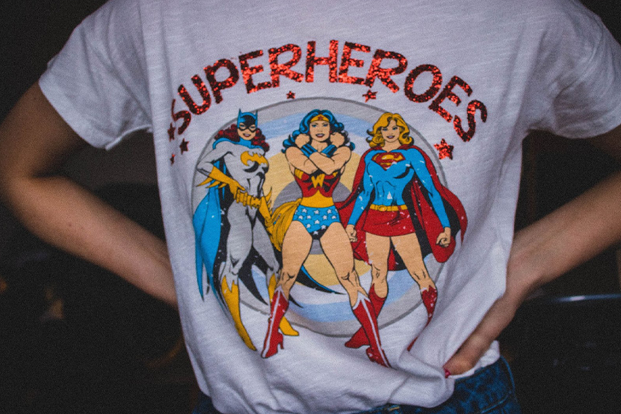Colorful T-shirt with retro superhero-themed graphics