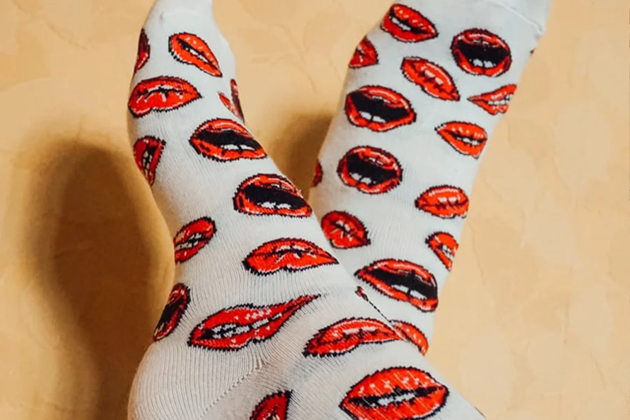 A woman wearing patterned socks