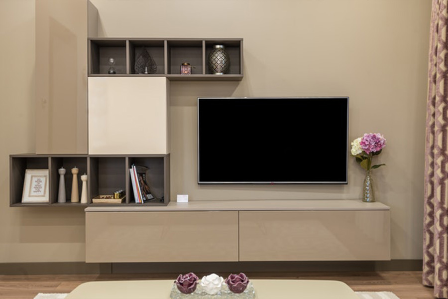 floating tv stand with a tv above