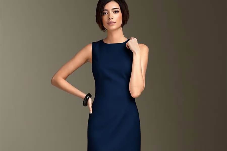 Lady in navy blue business cocktail dress