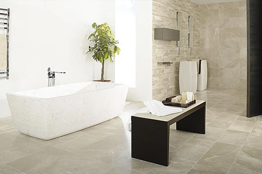 Large open bathroom with stone mosaic wall and floor