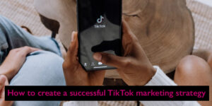 Man Holding Smartphone With Tiktok App