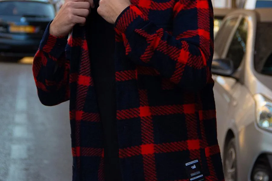 Man rocking a red and black flannel overshirt