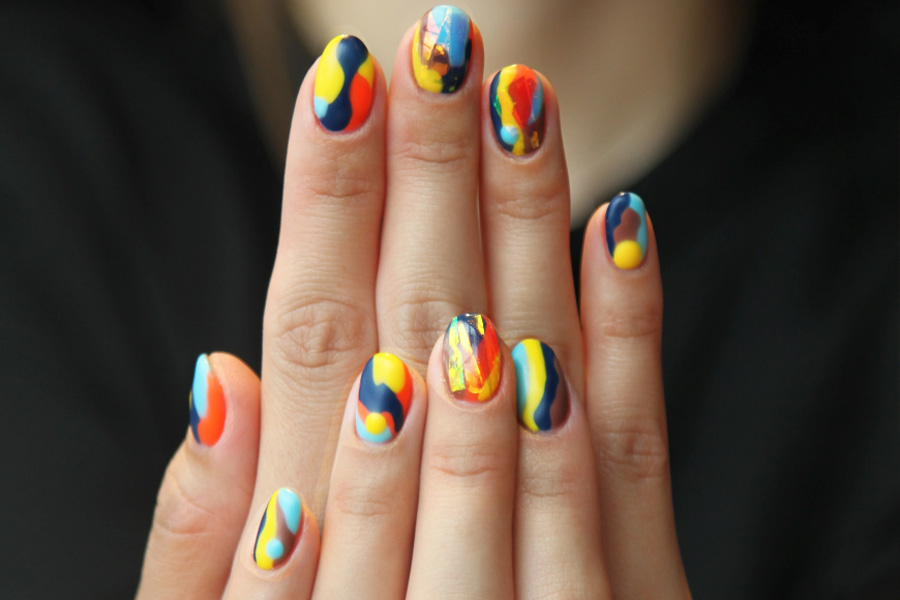 multi-colored abstract nails with wavy color blocked design