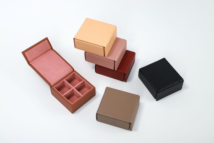 Multi-colored cardboard boxes with magnetic flap closure