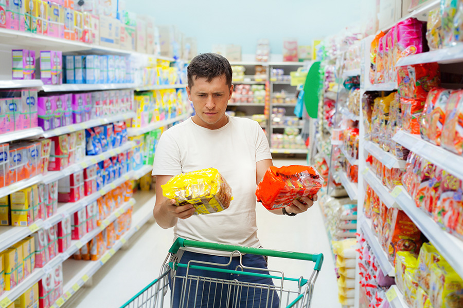 Shopper trying to decide between two similar products