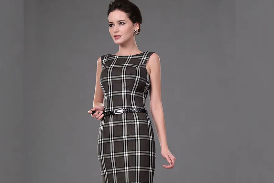 Woman in gray checkers business cocktail dress