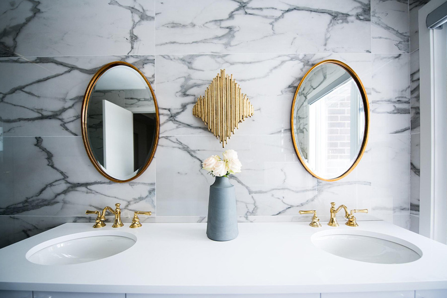 A bathroom vanity with stone cladding
