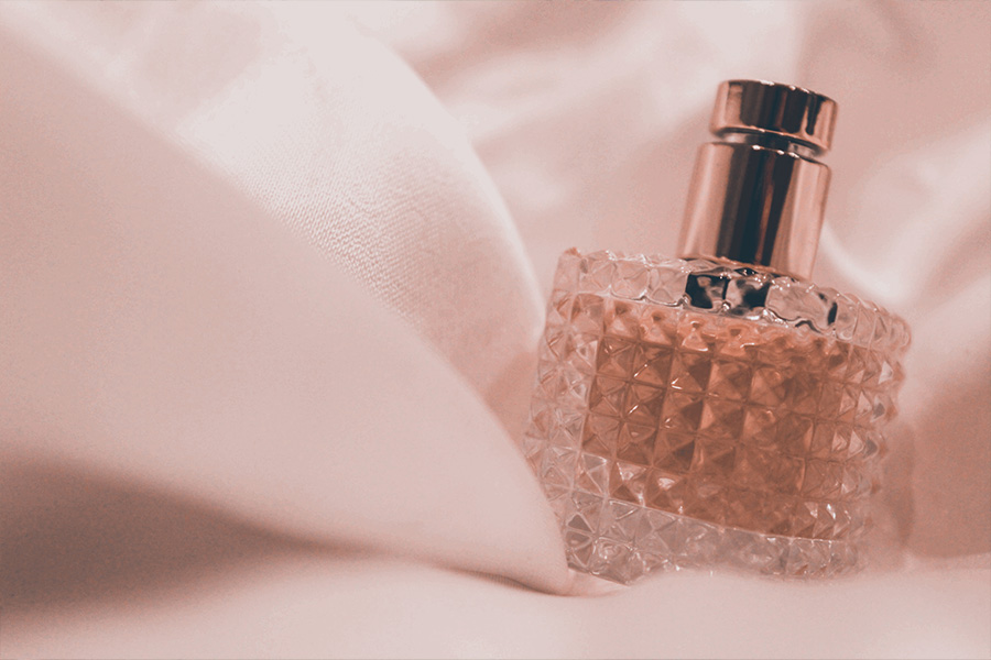 A bottle of fragrance on the cotton