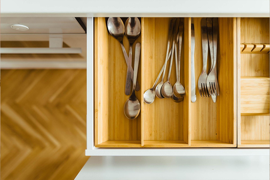A drawer organizer for cutlery