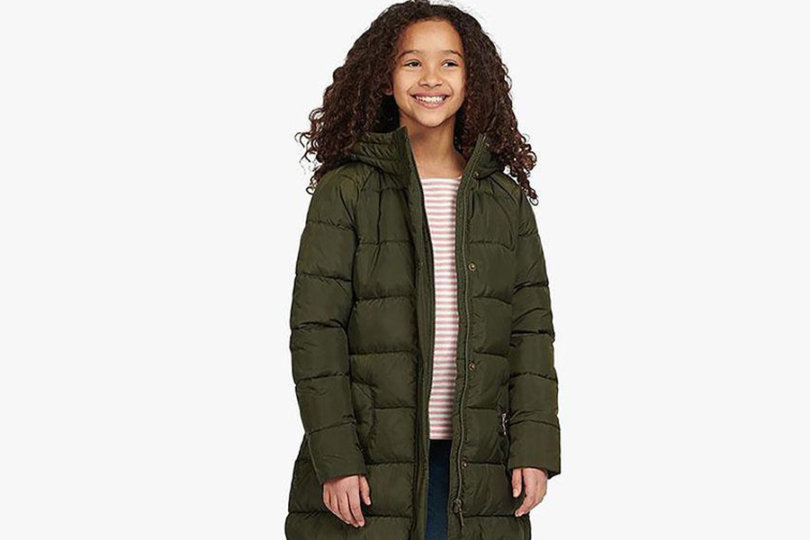 A girl in a dark green insulated down jacket