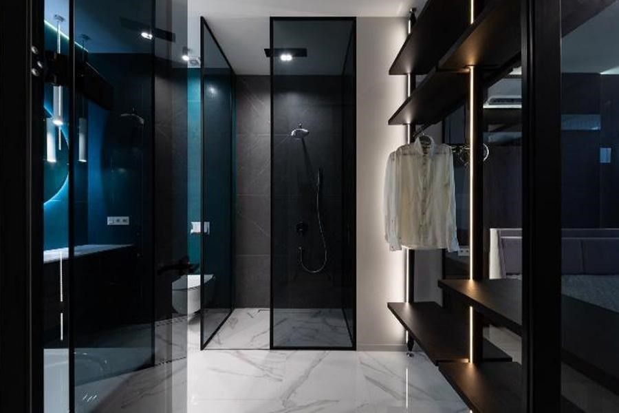 Bathroom with black tint glass walls