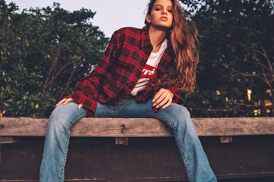 Beautiful lady in an over-sized flannel shirt
