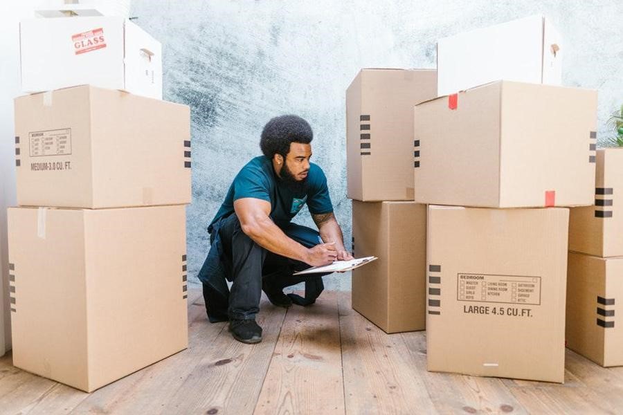 Black male tracking clients' shipment