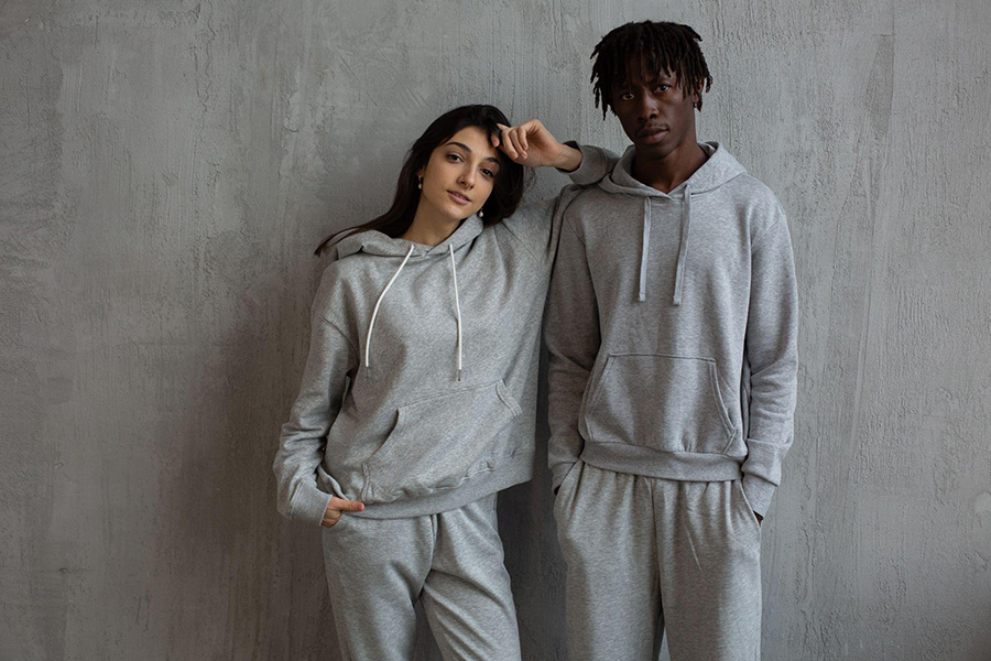 Couple in matching hoodies and sweatpants