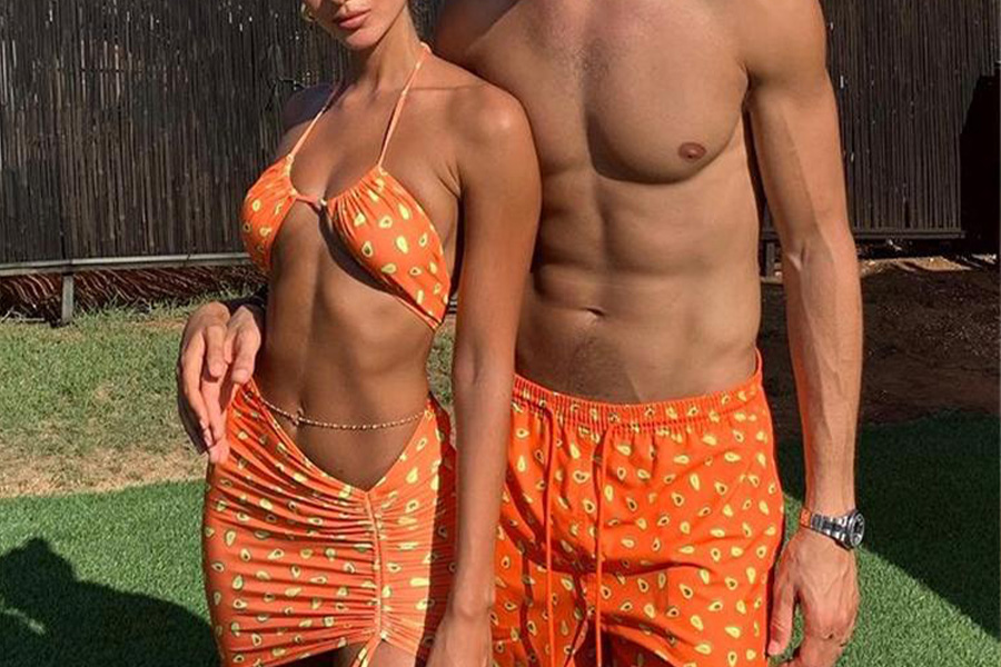 Couple wearing matching beach sets