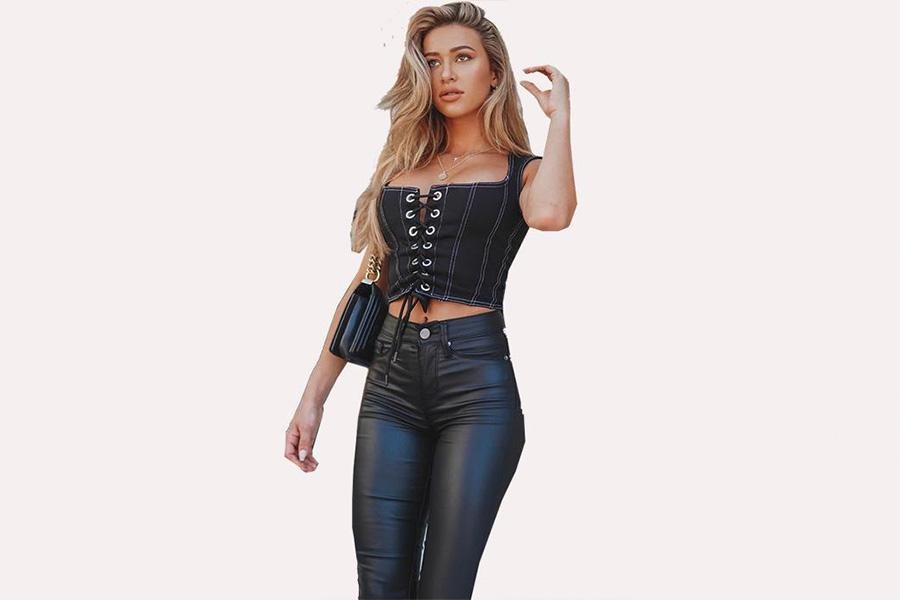 Cute lady rocking corset denim crop top and leather pants