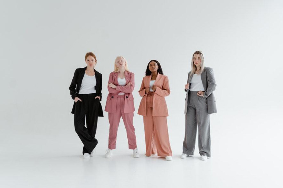 Four women rocking different trouser styles