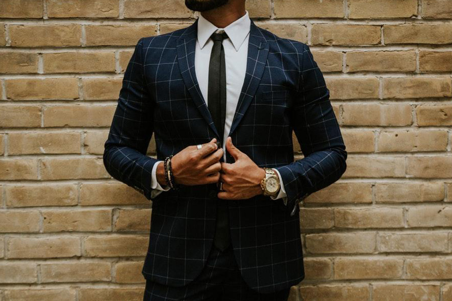 Man wearing a checkered suit set