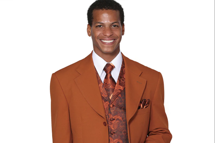 Man wearing an orange matching set high-stance suit