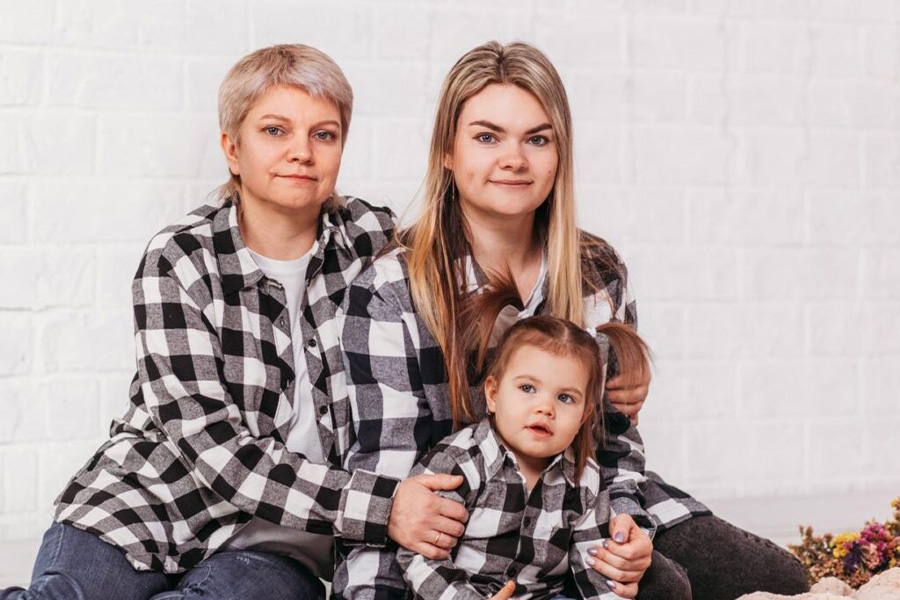 Mother And Daughters Wearing Matching T-shirts