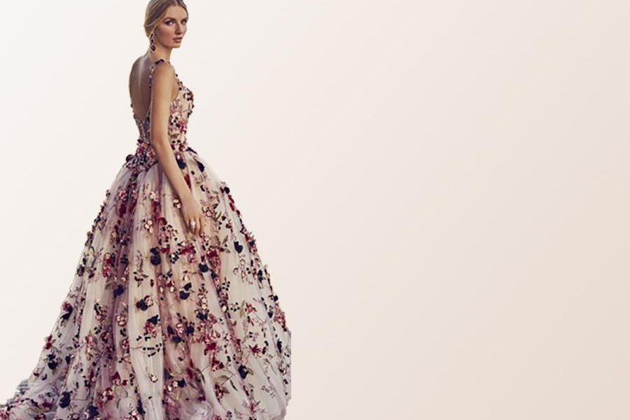 Tall blonde model rocking a floral wedding dress