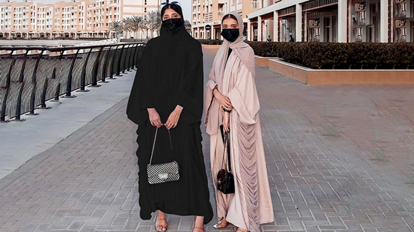 Two Women Wearing Arabic Abayas