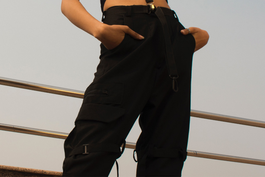 Woman wearing black cargo pants